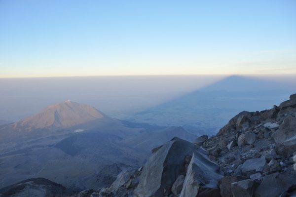 That's the shadow of Pico de Orizaba stretching for dozens of km across Mexico.